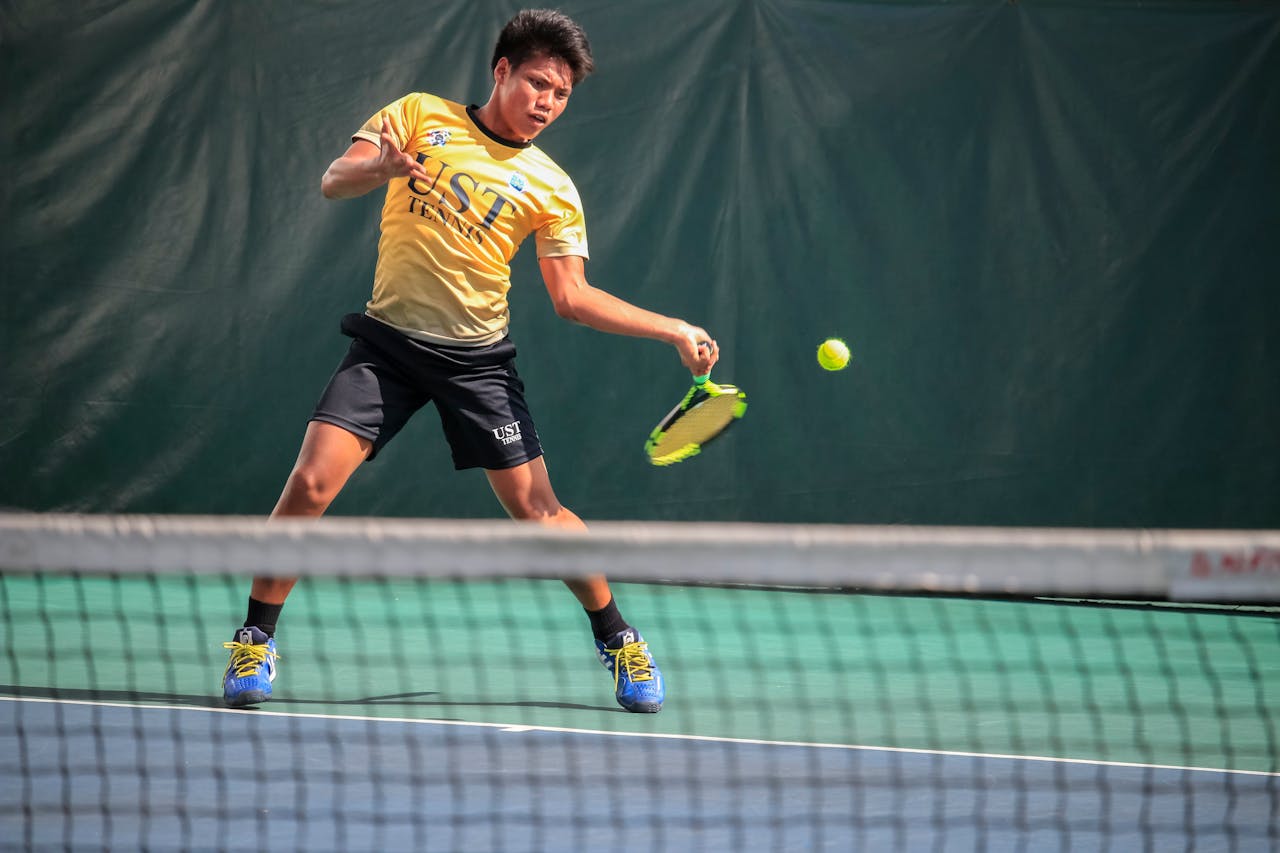 UST Player Playing Tennis